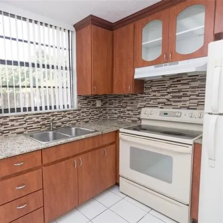 Rent this 2 bed condo on 1744 Nw 55th Ave Apt 103 in Lauderhill, Florida