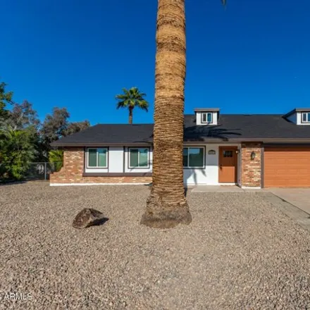 Buy this 4 bed house on 8803 North 106th Avenue in Peoria, AZ 85345