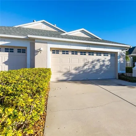 Buy this 2 bed house on 11321 Cambray Creek Loop in Riverview, FL 33579