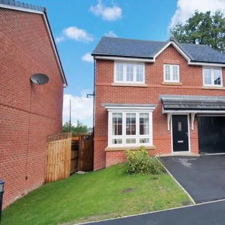 Buy this 4 bed house on Greenfield Lane in Smithy Bridge, OL16 2QX