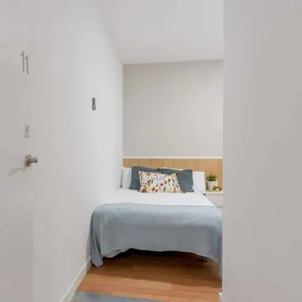 Rent this 11 bed room on Calle de Alejandro González in 5, 28028 Madrid