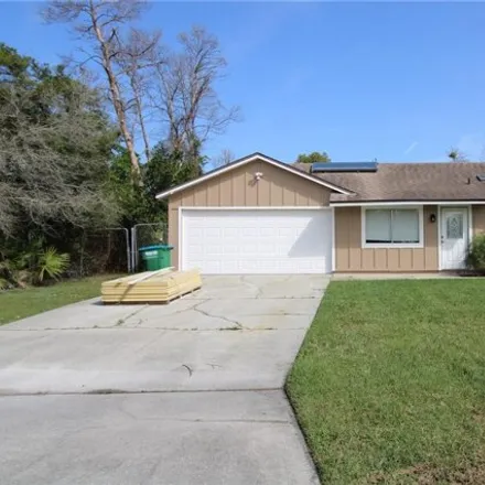 Rent this 3 bed house on 3056 Coventry Street in Deltona, FL 32738