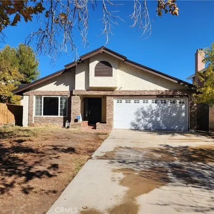 Rent this 4 bed house on 2625 Bottle Tree Drive in Palmdale, CA 93550