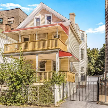 Buy this 7 bed townhouse on 321 East 196th Street in New York, NY 10458