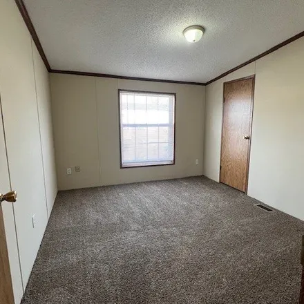 Buy this studio apartment on 29310 Birch Drive in Huron Charter Township, MI 48134