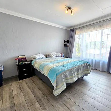 Rent this 2 bed townhouse on Bishop Bird Street in Rooihuiskraal-Noord, Simarlo AH