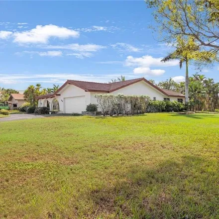Buy this 4 bed house on 504 Parkwood Lane in Naples, FL 34103