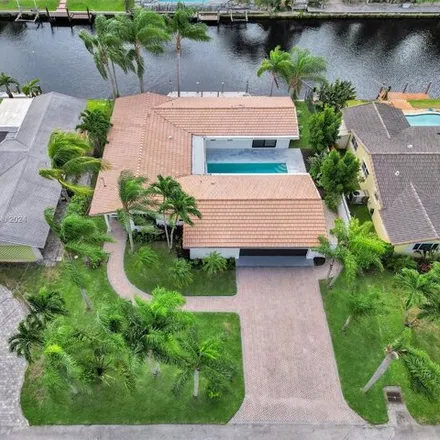 Rent this 3 bed house on Northeast 56th Court in Fort Lauderdale, FL 33334