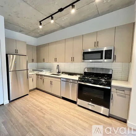 Rent this 3 bed apartment on 411 W Chicago Ave