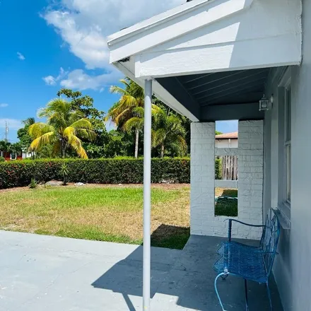 Rent this 3 bed house on 1221 15th Avenue South in Lake Worth Beach, FL 33460