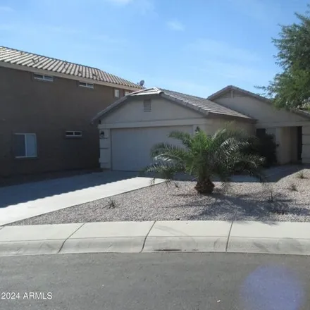 Rent this 3 bed house on 50 North 219th Drive in Buckeye, AZ 85326
