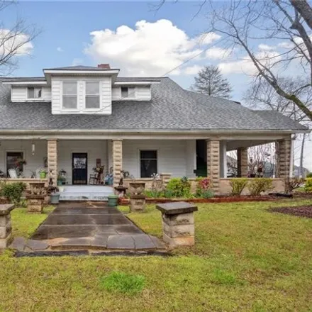 Buy this 7 bed house on 297 Covington Street in Loganville, GA 30052