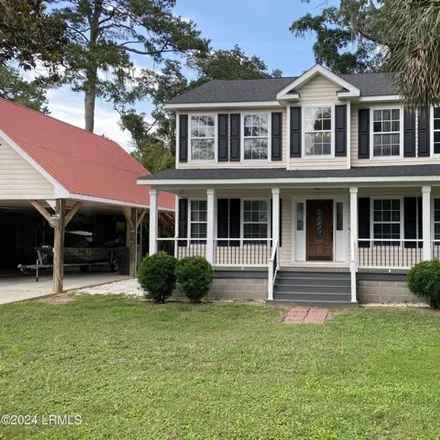 Rent this 4 bed house on 1 Fisherman Lane in Brighton Beach, Beaufort County