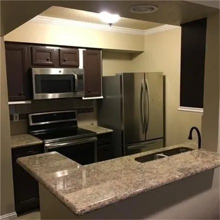 Rent this 1 bed condo on 4654 Westpark Drive in Houston, TX 77063