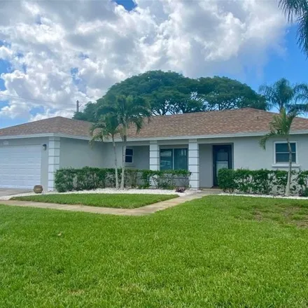 Rent this 3 bed house on 7111 11th Ave W in Bradenton, Florida