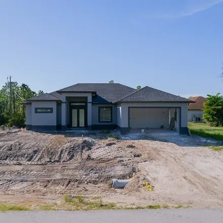 Buy this 3 bed house on 1730 West 9th Street in Lehigh Acres, FL 33972