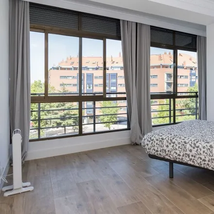 Rent this 8 bed room on Paseo de los Pontones in 29, 28005 Madrid