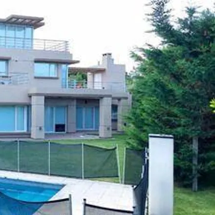 Rent this 5 bed house on Divisadero in Partido de Pinamar, 7169 Cariló