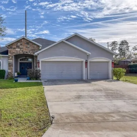 Buy this 5 bed house on 5056 Southwest 104th Loop in Marion County, FL 34476