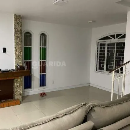 Rent this 3 bed house on Rua Arnaldo Balve in Jardim Itu, Porto Alegre - RS