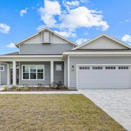 Buy this 4 bed house on 477 SW 144th Dr in Newberry, Florida