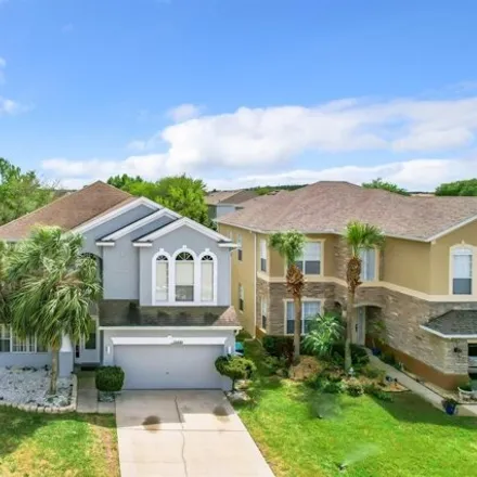 Rent this 5 bed house on 13440 Meadow Bay Loop in Meadow Woods, Orange County