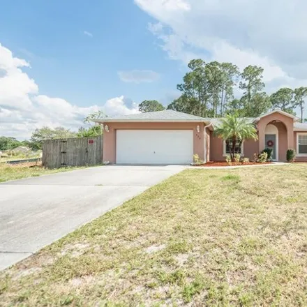 Buy this 3 bed house on 428 Truvall Street Southwest in Palm Bay, FL 32908