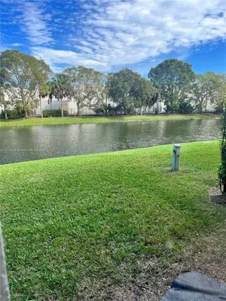 Rent this 3 bed townhouse on 10201 Via Hibiscus in Mission Bay, Palm Beach County