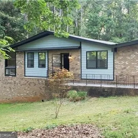 Rent this 4 bed house on 1000 Mountain Woods Court Southwest in Mountain Park, GA 30087