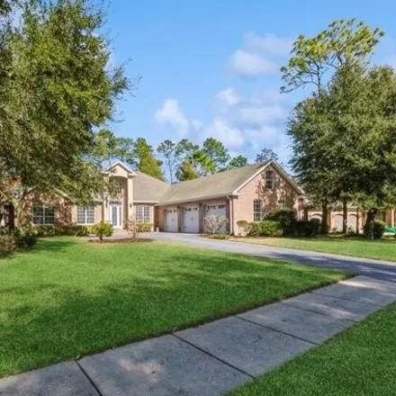 Buy this 4 bed house on 9019 Rushing River Way in Niceville, FL 32578