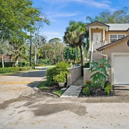 Rent this 3 bed condo on Crescent Lake Drive in Collier County, FL