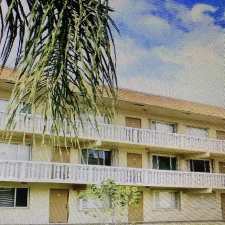 Buy this 1 bed condo on 400 Village Green Circle West in Palm Springs, FL 33461