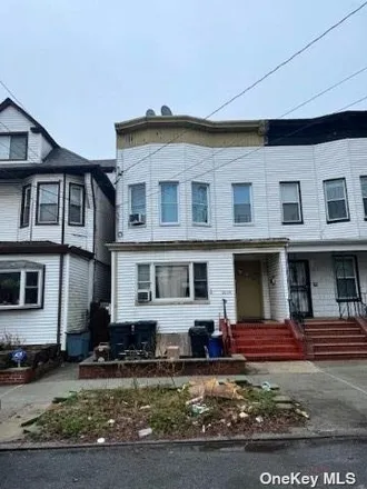 Buy this 4 bed house on 86-04 89th Street in New York, NY 11421