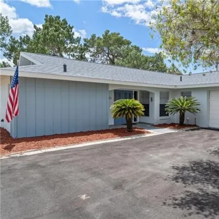 Buy this 3 bed house on 11918 West Coquina Court in Citrus County, FL 34429