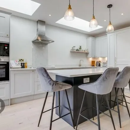 Rent this 4 bed townhouse on 49 Smeaton Road in London, SW18 5JJ