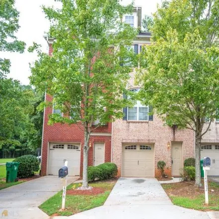 Buy this 3 bed townhouse on 4942 Mountainside Trl in Stone Mountain, Georgia