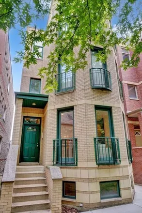 Rent this 4 bed condo on 2319 N Lister Ave Apt 1 in Chicago, Illinois