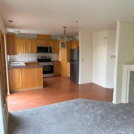 Rent this 2 bed condo on 5264 NE 121st Ave