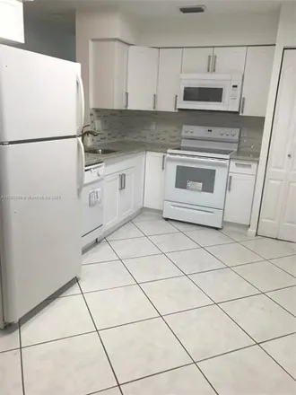 Rent this 3 bed condo on 830 Northeast 212th Terrace in Miami-Dade County, FL 33179