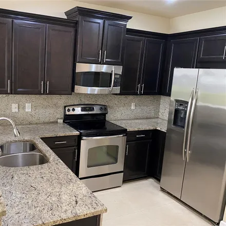 Rent this 4 bed townhouse on 8920 Northwest 98th Avenue in Doral, FL 33178