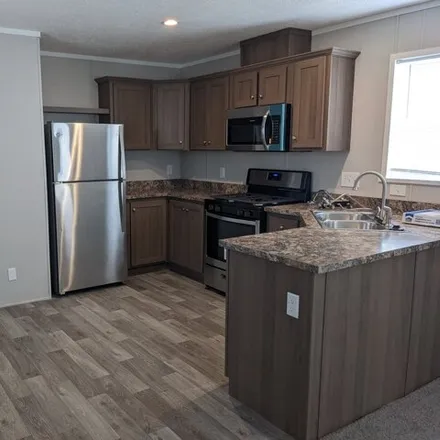Buy this studio apartment on 18 Mulberry in Sumpter Township, Wayne County