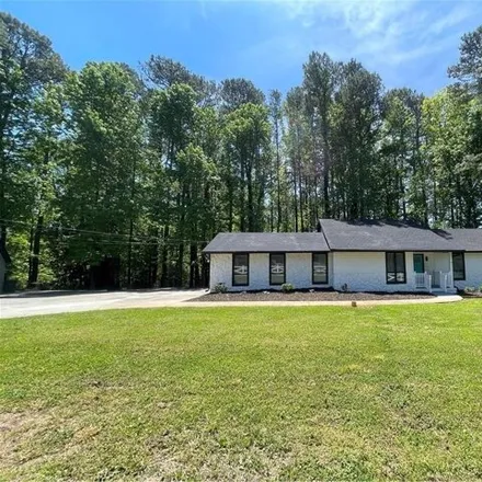 Buy this 3 bed house on Mystery Valley Golf Club in 6094 Shadow Rock Drive, Lithonia