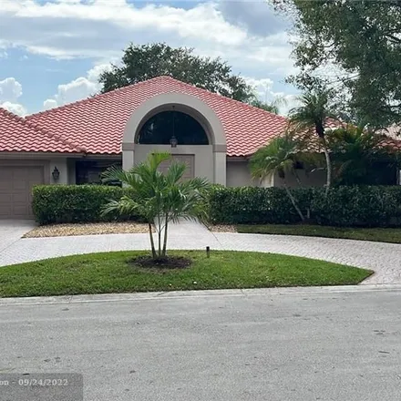 Rent this 4 bed house on 12616 Burning Tree Lane in Coral Springs, FL 33071