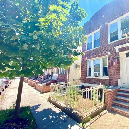 Buy this 7 bed townhouse on 1764 71st Street in New York, NY 11204
