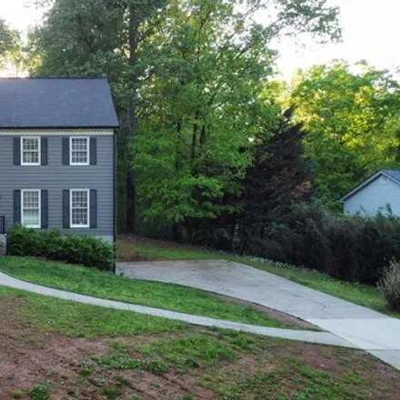 Buy this 4 bed house on 11230 Hembree Springs Drive in Roswell, GA 30076
