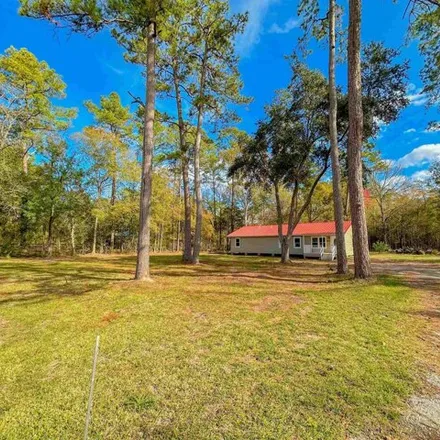 Buy this 4 bed house on 6624 Crosstimber Drive in Mauriceville, Orange County