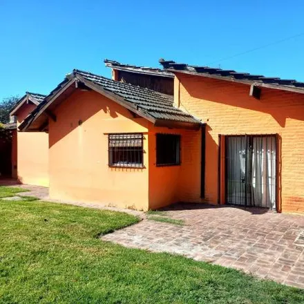 Buy this 5 bed house on Corrientes in Partido de San Miguel, B1661 INW Bella Vista