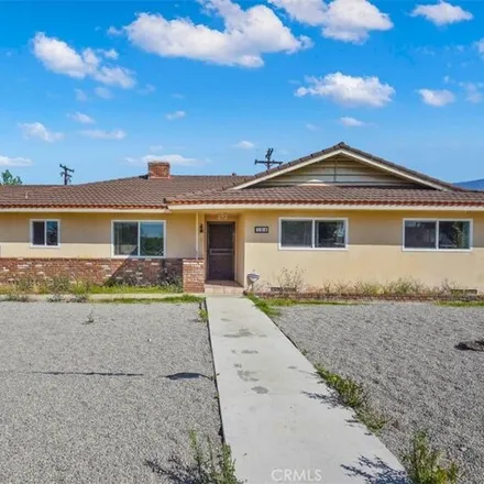 Rent this 3 bed house on Alley in San Bernardino, CA 92405
