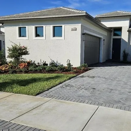 Buy this 3 bed house on 12130 Sw Fortezza Way in Port Saint Lucie, Florida