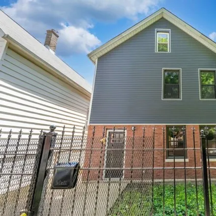 Buy this 4 bed house on 4435 West Carroll Avenue in Chicago, IL 60624